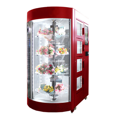 病院のモールの透明な棚によって冷やされている加湿システムが付いている自動花の自動販売機